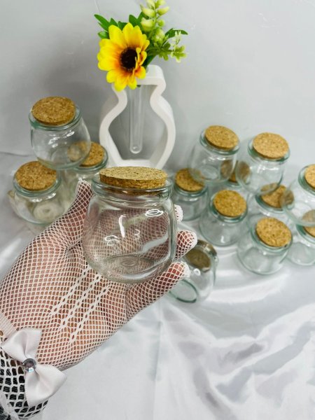 جرة زجاج مع غطا فلين لصب الشمع